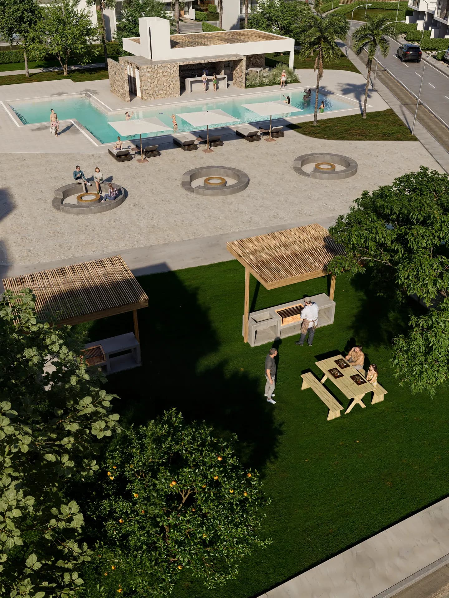 Vista aérea de la piscina, la zona de fogatas y las pérgolas de parrilla