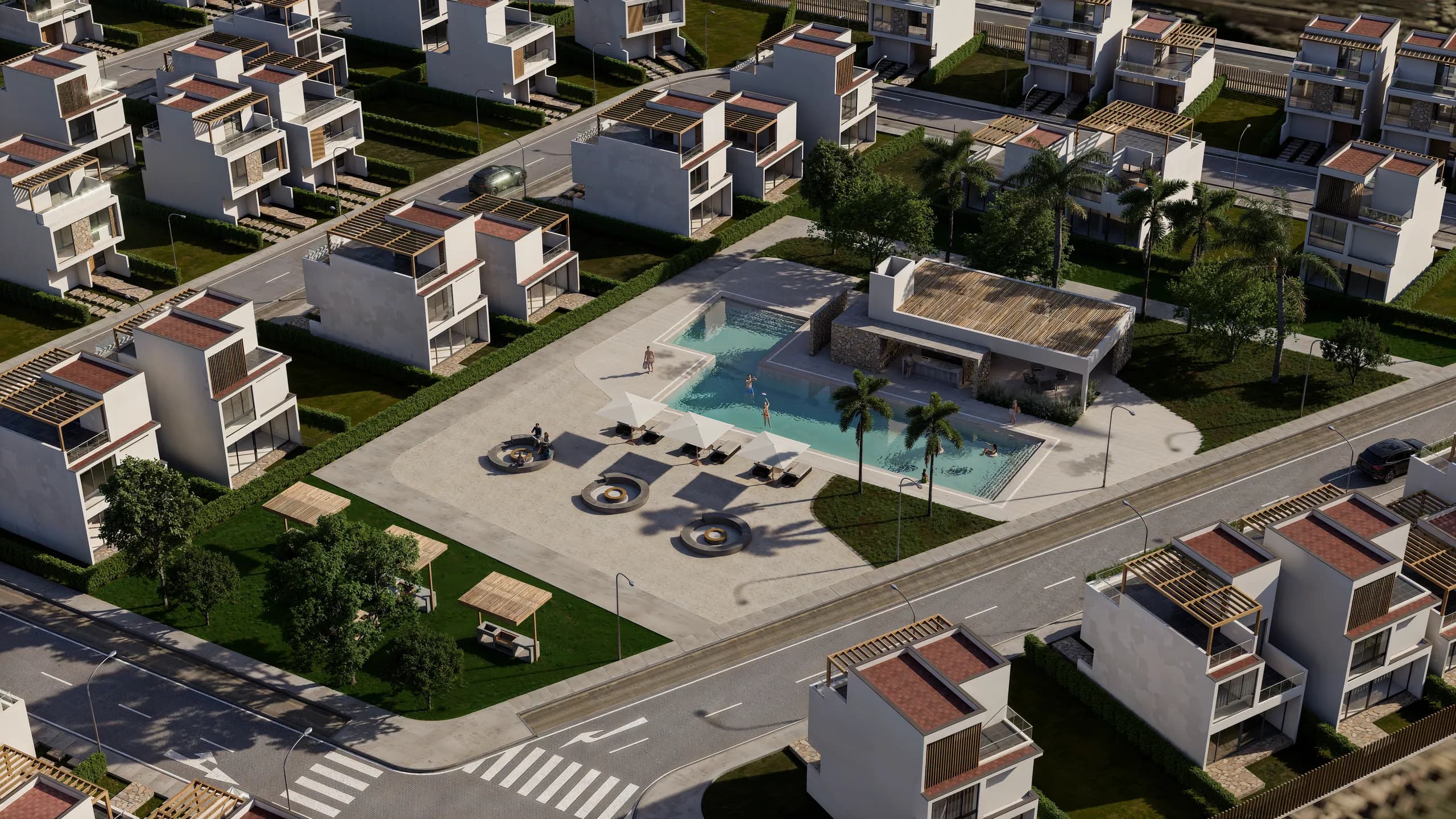 Vista aérea del club house, la piscina y la zona de fogatas
