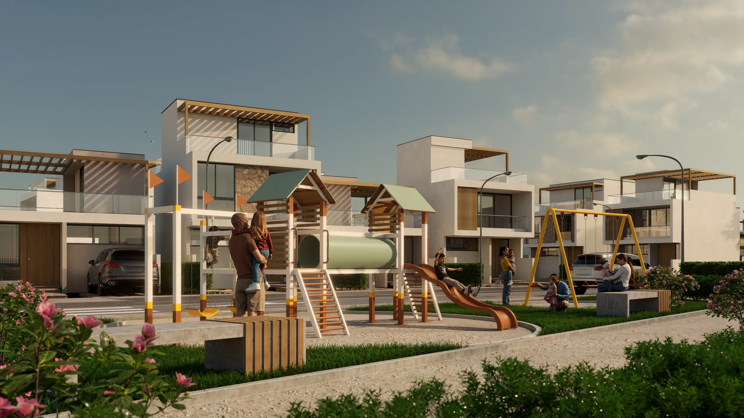 Módulo de juegos infantiles con torre, tobogán y columpios entre las casas